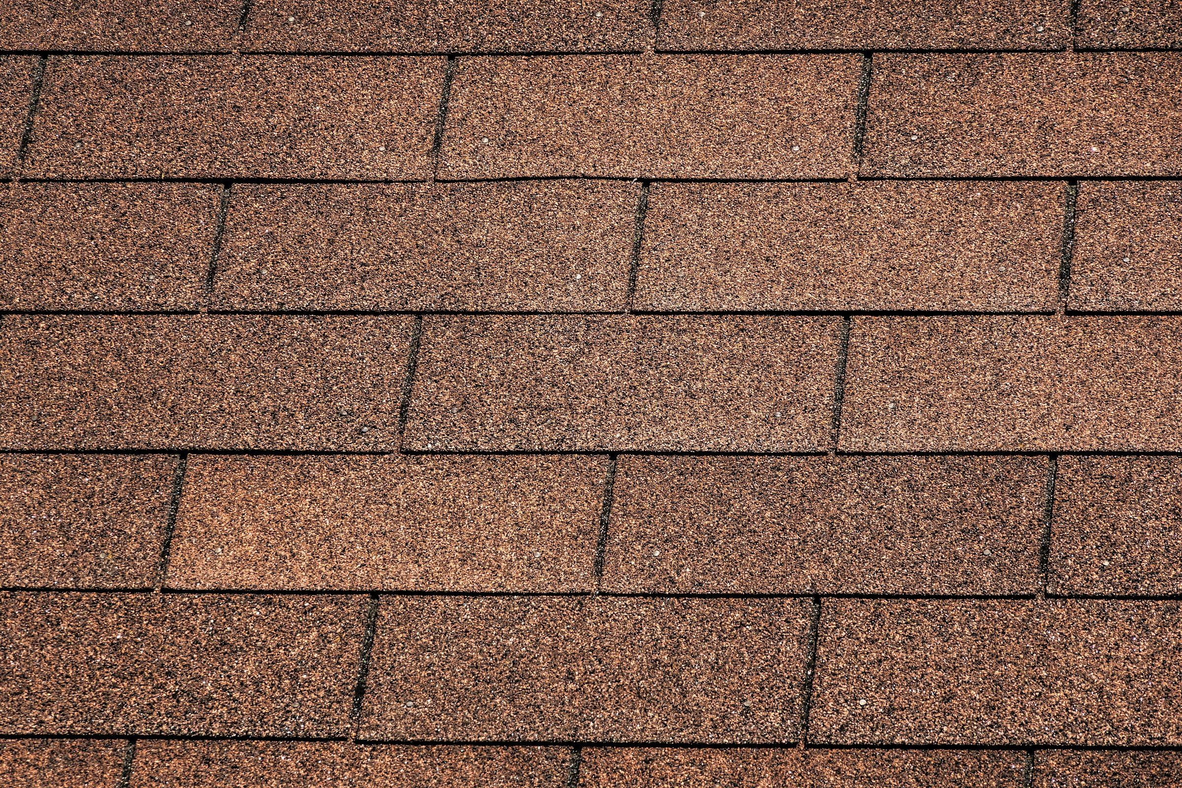 Close-up of brown architectural asphalt shingles